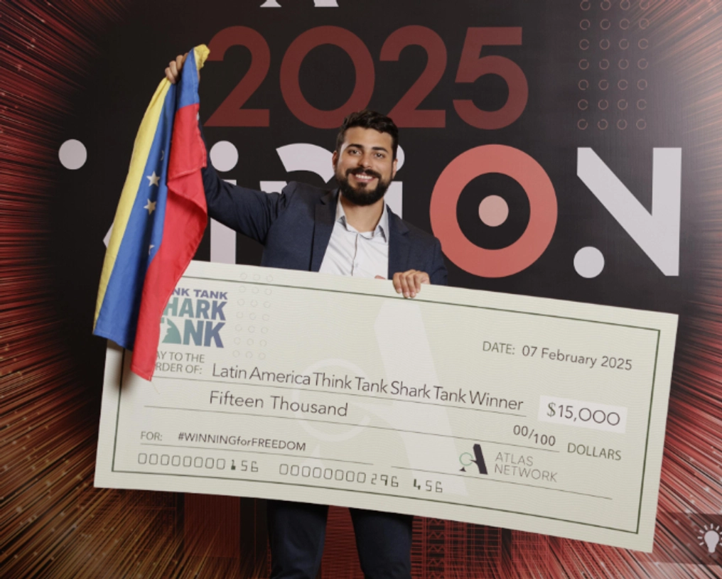 Alfredo Flores after winning Atlas Network' Think Tank Shark Tank pitch competition